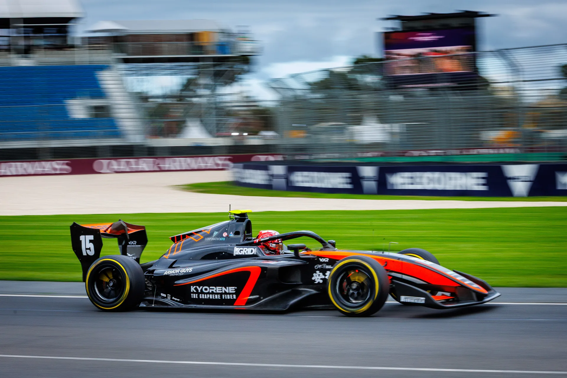 Enzo Deligny walking through the Melbourne Grand Prix paddock 2026